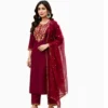 Beautiful woman wearing a maroon Roman silk embroidered kurta set with matching pants and sheer dupatta, ideal for festive occasions, weddings, office wear, and ethnic celebrations.