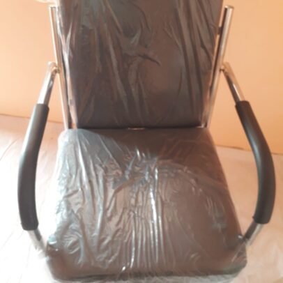 Black cushioned office visitor chair with metal frame and armrests