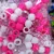 Multicolor plastic pony beads in pink white and transparent colors for jewellery making and DIY craft projects.