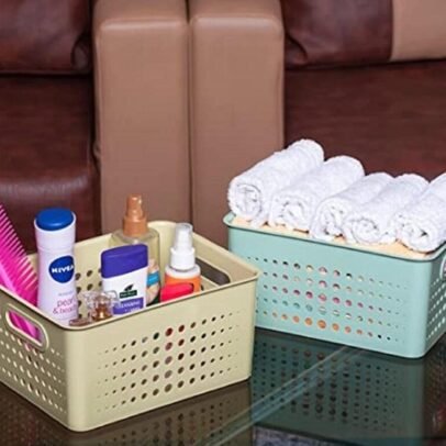 Multicolor perforated plastic storage basket with handles,.