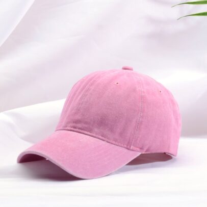 Pastel pink adjustable baseball cap for women with curved visor and breathable design for casual outings, sports and outdoor activities