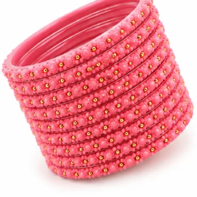 Pink floral beaded bangles set of 24 with golden bead detailing for women and girls.