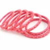 Pink floral beaded bangles set of 24 with golden bead detailing for women and girls.