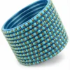 Set of 24 turquoise blue bangles with golden bead design for women and girls.