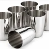 Pack of 6 stainless steel drinking glasses with polished mirror finish for home kitchen and dining use.