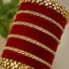 Red velvet bridal bangles set with 34 designer wedding chura bangles for women, traditional ethnic jewelry collection for bridal wear, wedding functions and festive occasions.