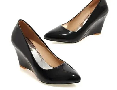 Women's black wedge heel pumps with glossy finish, slip-on design, closed pointed toe, comfortable wedge heel for office, party, wedding and casual wear.