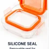 Square glass food storage container with removable silicone seal, airtight locking lid, food-grade glass body, and multi-colour design for kitchen food storage.