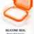 Square glass food storage container with removable silicone seal, airtight locking lid, food-grade glass body, and multi-colour design for kitchen food storage.