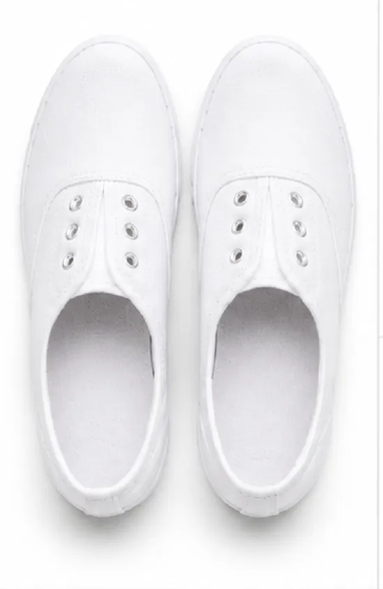 Kids white canvas school shoes with breathable fabric upper, lightweight rubber sole, lace-up eyelets, comfortable everyday uniform shoes for boys and girls.