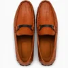 Premium tan brown perforated slip-on loafers for men with soft cushioned insole, breathable casual driving shoes for office, travel and daily wear.