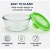 Round airtight food storage container with 4 side locking clips, leak-proof lid, transparent body, and multi-colour design for kitchen food storage.