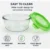 Round airtight food storage container with 4 side locking clips, leak-proof lid, transparent body, and multi-colour design for kitchen food storage.