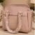 Women's Blush Pink Textured Top Handle Handbag with Dual Handles and Adjustable Shoulder Strap